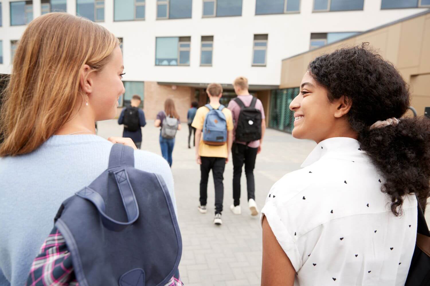 students walk to high school