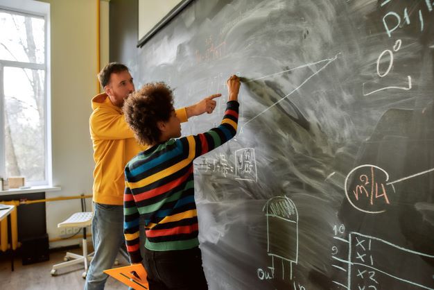  teacher helps student with new math