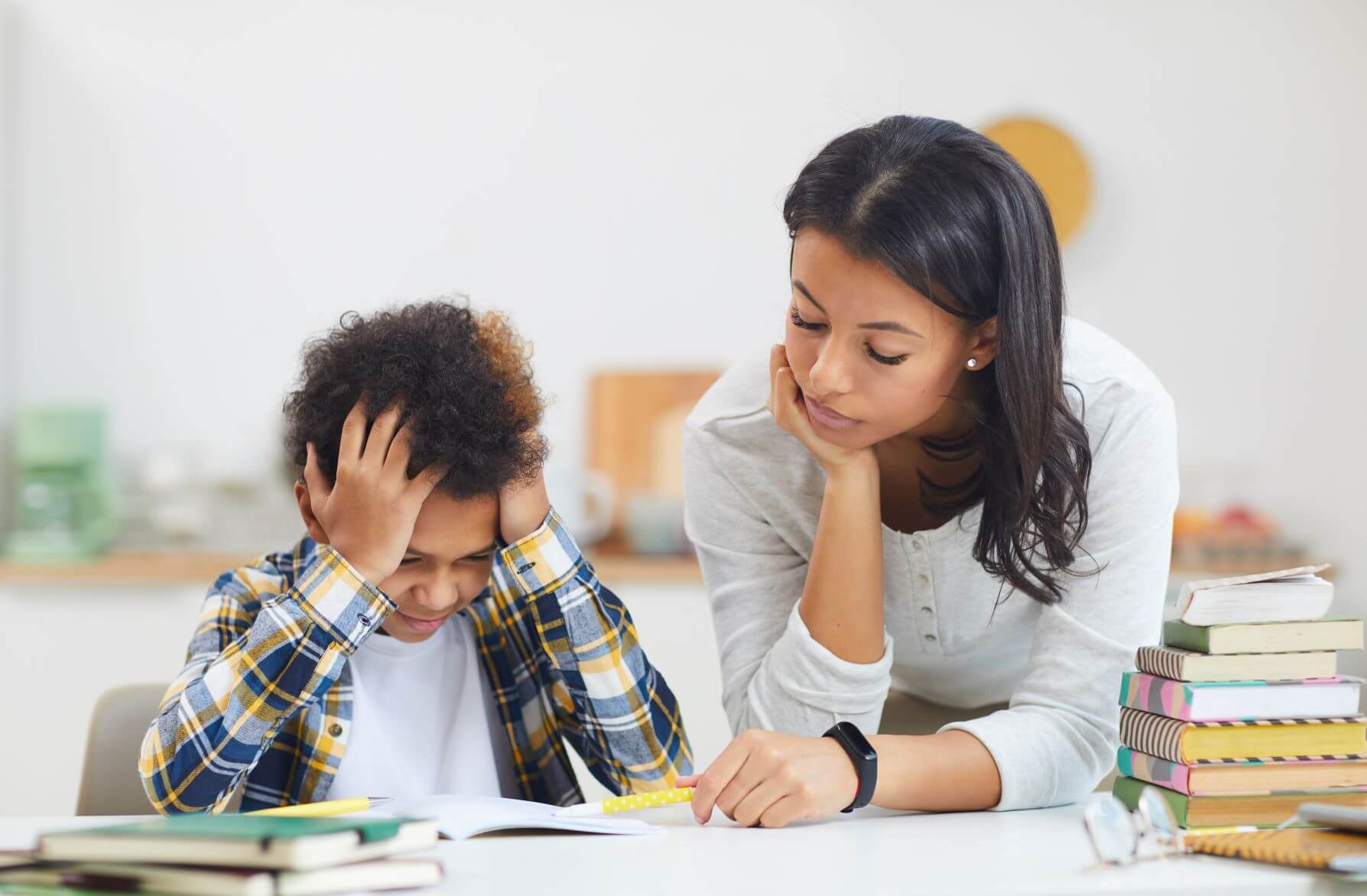 mom helping kid study effectively