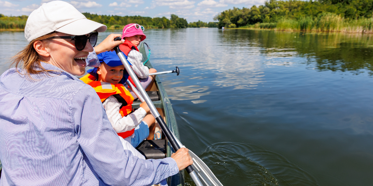 Family applies real-world math on a summer canoe trip, calculating distance, speed, and travel time while exploring nature and preventing summer math skill loss.