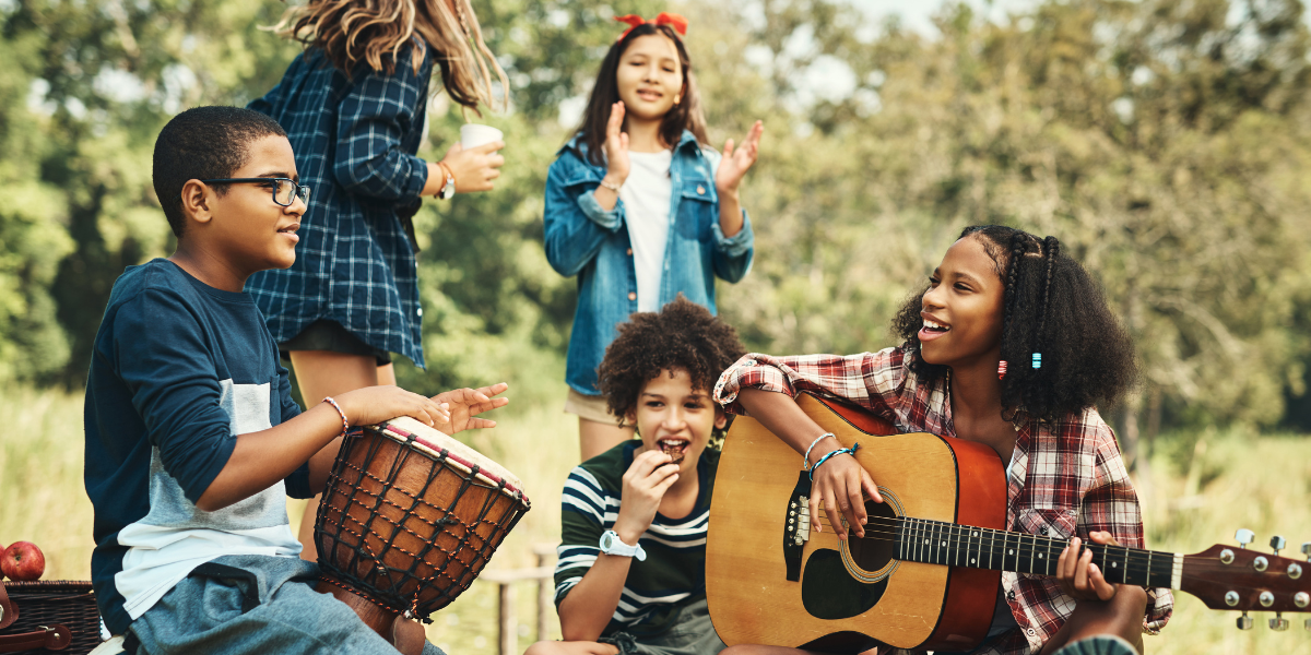 How music heals through outdoor group performance and creative expression activities
