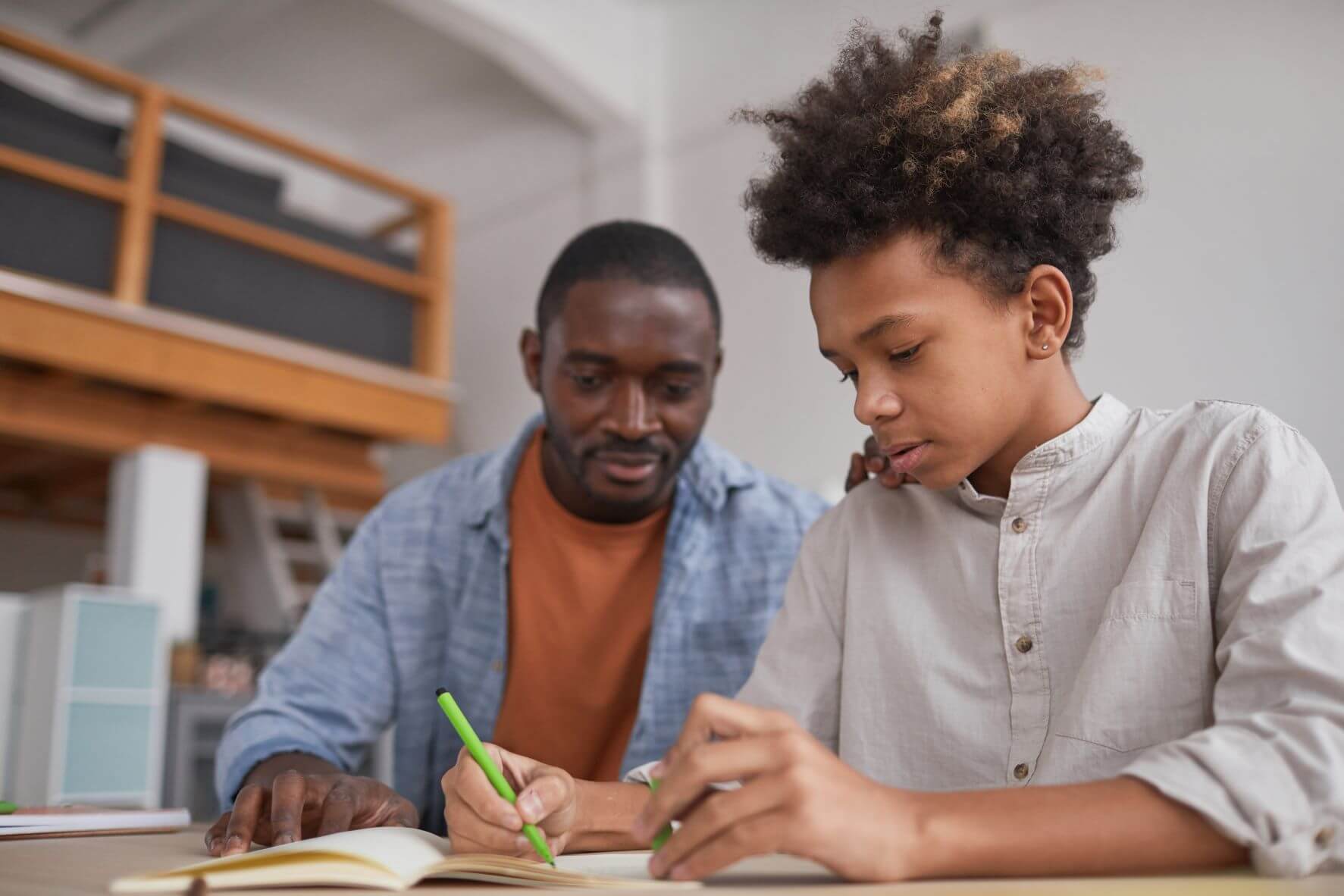 One on one tutor helps boy