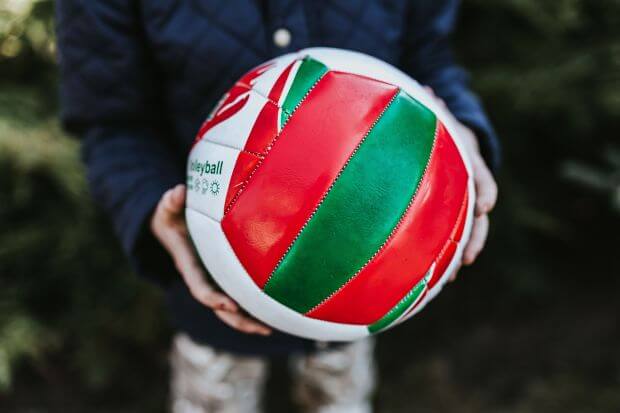 image for article on healthy competition ideas in schools - photo of child hands holding ball