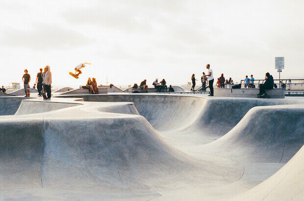 Kids learning to skateboard