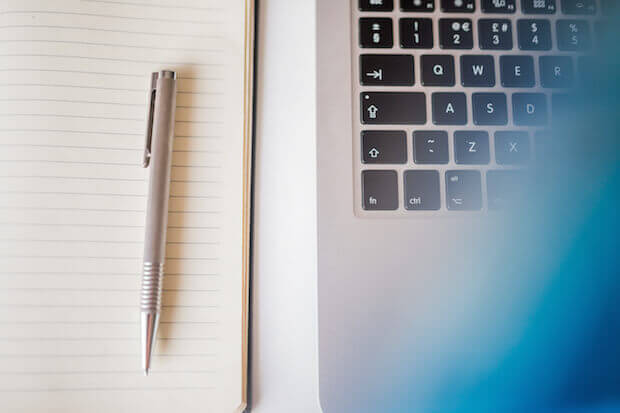 keyboard and notebook - article featured image on using open educational resources