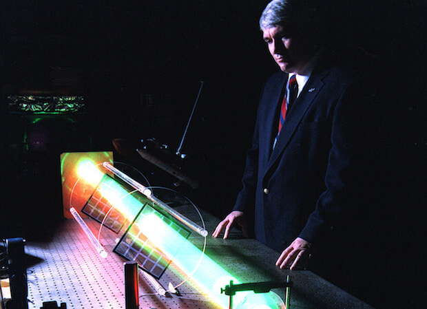 man with telescope lit up - featured image for article on the push for STEM education in canada