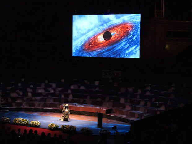 Stephen Hawking speaking at an event - a modern-day scientist to inspire kids