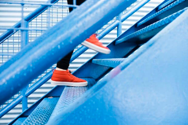 feet walking up stairs - featured image for article on Montessori adolescent program